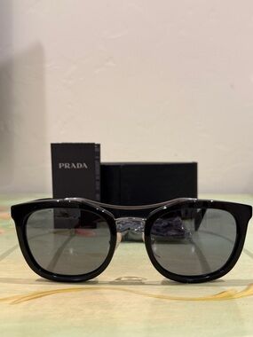 Prada Black Frame Sunglasses with Dark Gray Lenses